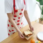 girl in cute tomato apron