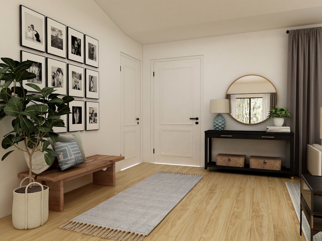 Compact apartment entryway with storage bench and wall hooks for shoes, bags and coats